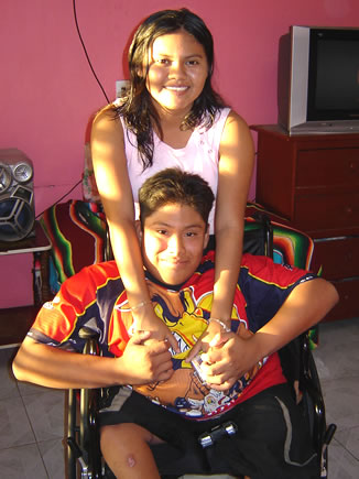 Azucena Puc with Cousin Gonzalo J. Puc and his new wheelchair